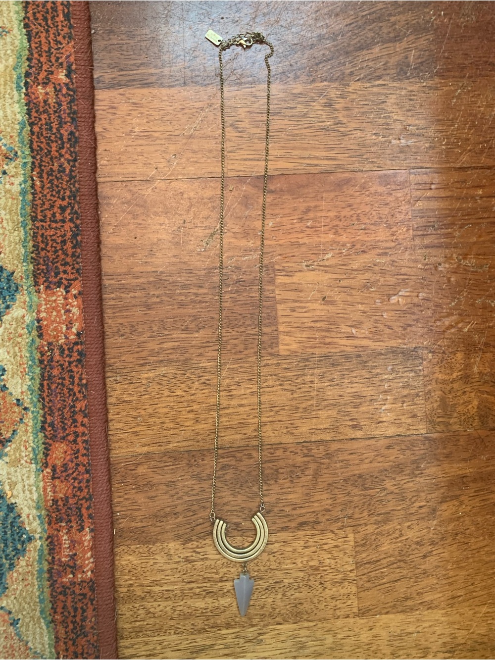 Gold Crescent Pendant Necklace with Gray Arrow Charm
